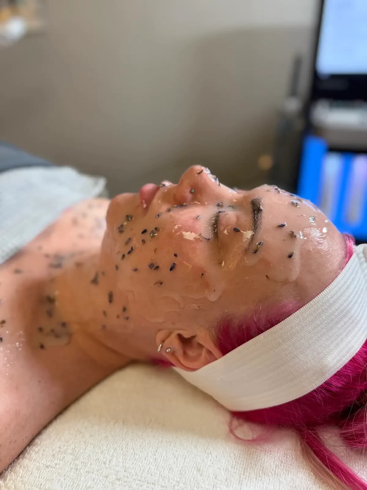 A Rella provider applying an in-clinic facial treatment