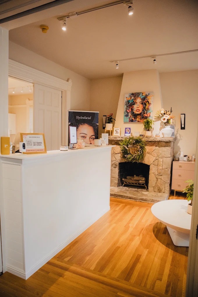 Reception desk and stone fireplace inside Napa House